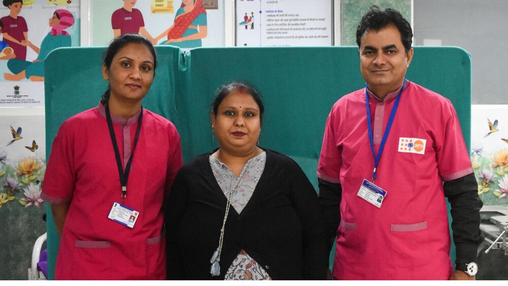 Midwives with patient
