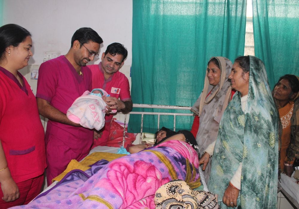Figure 13: Neerma with her midwives, Dinesh, Prakash, and Lalita